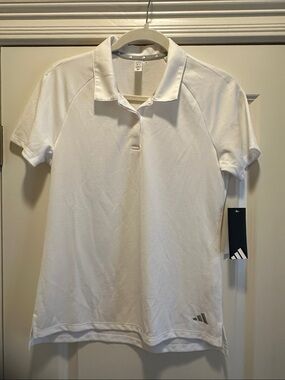 adidas White Short-Sleeve Polo Shirt pairs well with tennis skirt in my closet